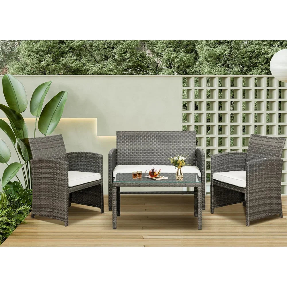 Multi-Piece Rattan Patio Conversation Set with Glass Table